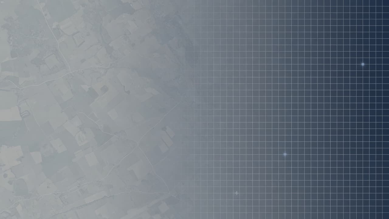 Abstract county landscape dissolving into a soft data grid